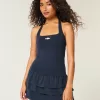 Top con scollo all’americana e grafica con perline