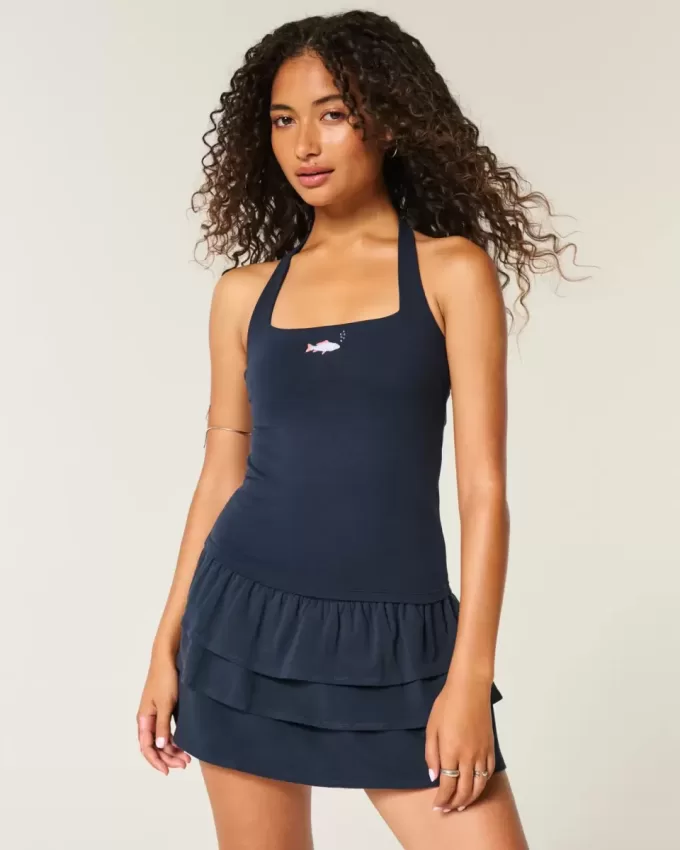 Top con scollo all’americana e grafica con perline