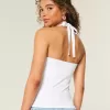 Top con scollo all’americana e grafica con perline Top con scollo all’americana e grafica con perline