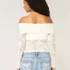 Top con spalle scoperte e pizzo integrale
