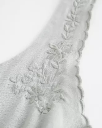 Top in misto lino con bottoni