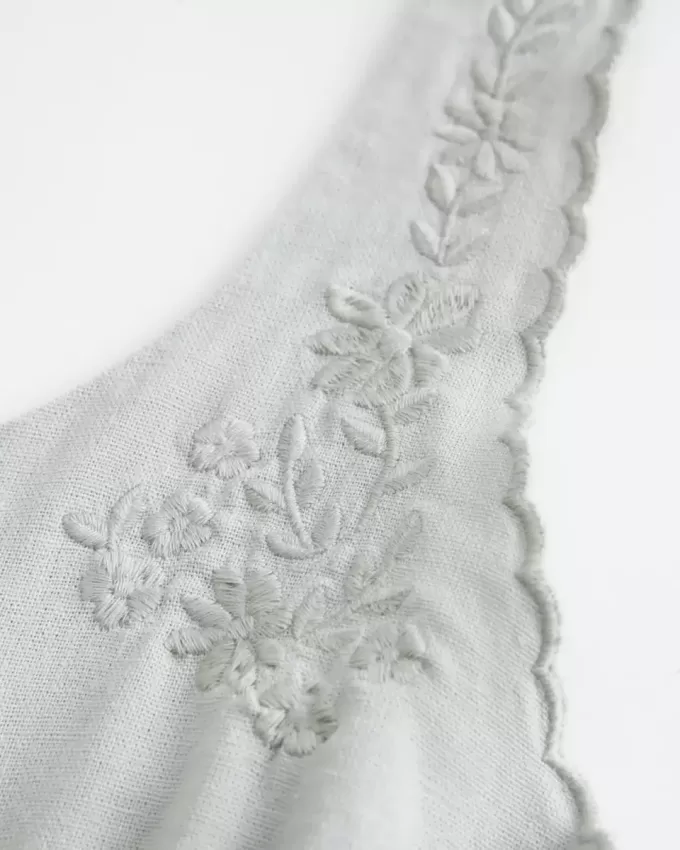 Top in misto lino con bottoni
