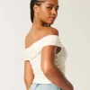 Top in pizzo con scollo a V e spalle scoperte