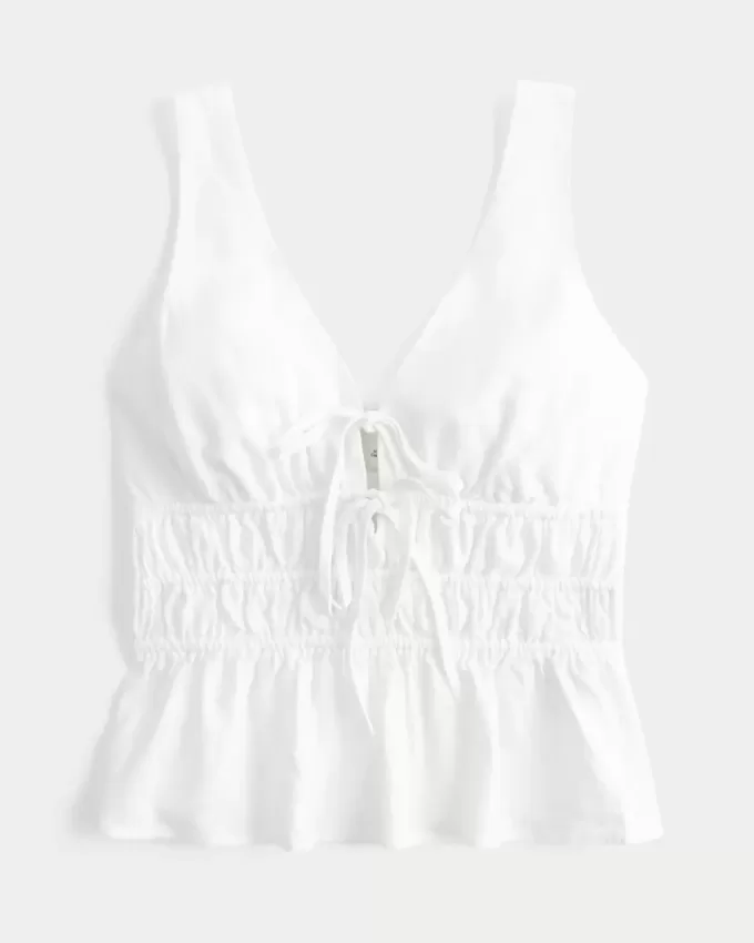 Top peplo con nodo frontale in misto lino Top peplo con nodo frontale in misto lino