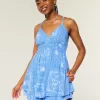 Tutina babydoll con schiena scoperta Tutina babydoll con schiena scoperta